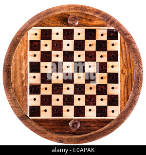 an empty circular wooden chess board isolated over white Stock Photo