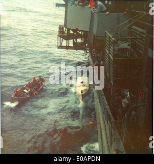 Navy HS-2 being repaired by USS Hornet after open sea landing1968-1969 Stock Photo