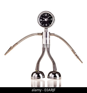 a chrome robot shaped clock isolated over a white background Stock Photo
