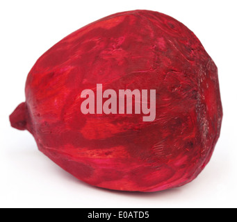 Closeup of peeled red beet over white background Stock Photo