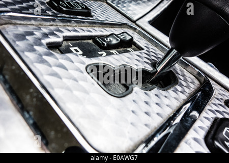a very dirty, but still luxurious, sport car gear box Stock Photo