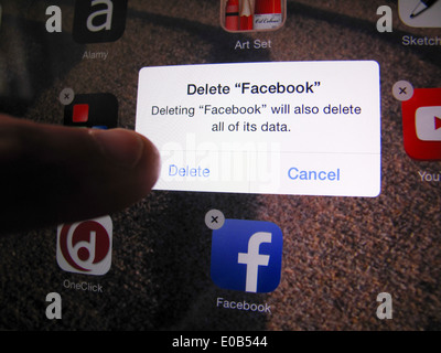 Deleting Facebook from iPad Stock Photo