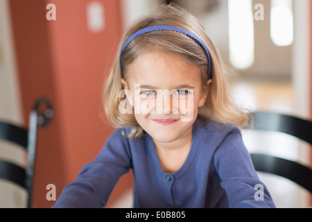 Portrait of smiling cute young girl Stock Photo