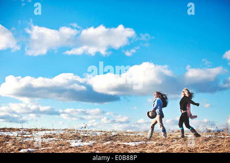 Two mature women enjoying exhilarating walk