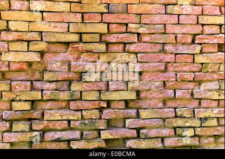 A house wall of brick stones. Brick wall as a background with text clearance Stock Photo