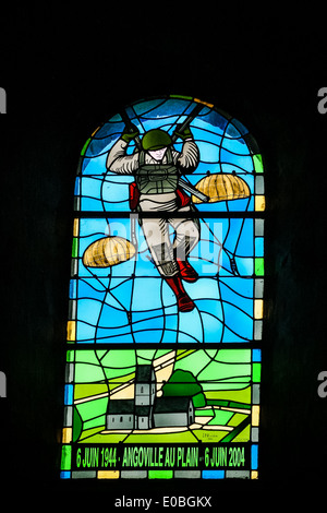 Stained glass window commemorating the D-Day landings in a church in Angoville au Plain, Normany, France Stock Photo