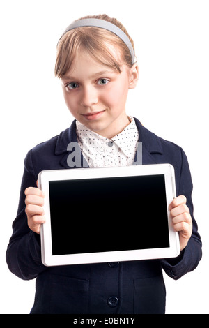 Little blond girl with tablet device on white background Stock Photo