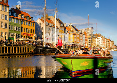 Excursion boat, Nyhavn canal, Copenhagen, Denmark Stock Photo