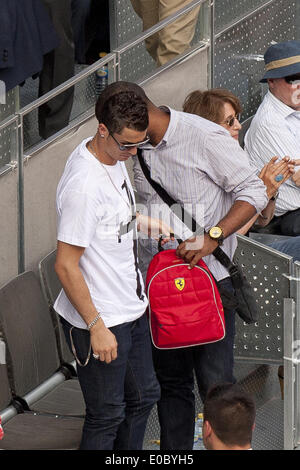 Madrid, Spain. 8th May, 2014. The Real Madrid player Cristiano Ronaldo attends with her son, tennis match of Rafa Nadal in the Mutua Madrid Open tennis tournament at the Caja Magica on May 8, 2014 in Madrid, Spain. (Photo by Oscar Gonzalez/NurPhoto) Credit:  Oscar Gonzalez/NurPhoto/ZUMAPRESS.com/Alamy Live News Stock Photo