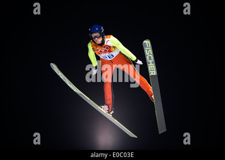 Daniela Iraschko-Stolz (AUT) competing in Women's Ski Jumping at t he Olympic Winter Games, Sochi 2014 Stock Photo