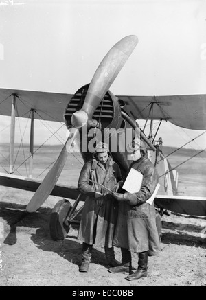 A pilot and observer in front of a Bristol aircraft Stock Photo