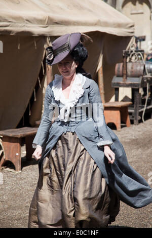Corsham, Wiltshire, UK. 7th May 2014. An Actress on the film set of Poldark Stock Photo