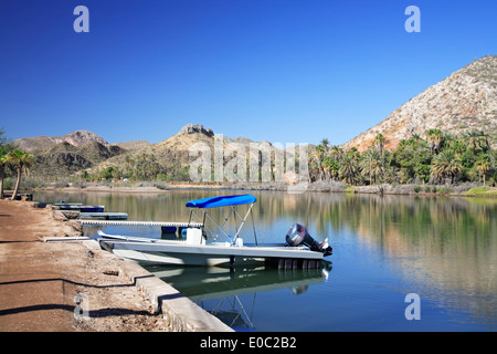 Boat, Mulege River and butte, Mulege, Baja California Sur, Mexico Stock Photo