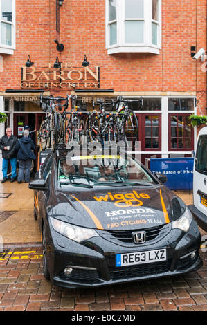 A Wiggle Honda Team support vehicle loaded with spare bikes awaiting the start of the Womens Tour 2014 in Hinckley Stock Photo