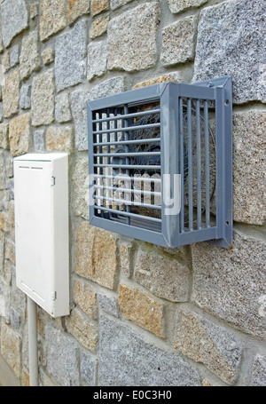 a heating ventilator on the outside of a building Stock Photo