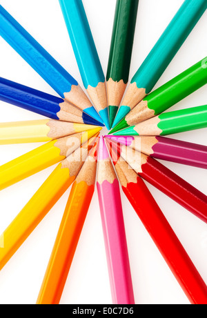 Many different coloured colour pencils on a white background., Viele verschiedene bunte Farbstifte auf einem weissem Hintergrund Stock Photo