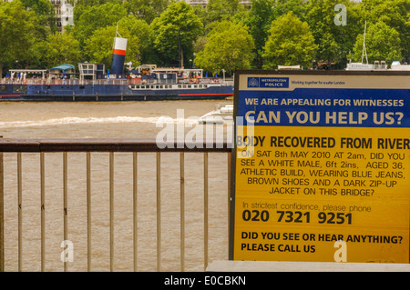 Police requesting help sign of body recovered information board beside the River Thames London England UK Stock Photo