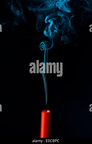 The flame of a candle was blown out. Symbol die for death, and past, Die Flamme einer Kerze wurde ausgeblasen. Symbol fuer Tod, Stock Photo