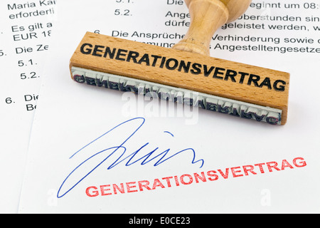 A stamp of wood lies on a document. Label Generation contract, Ein Stempel aus Holz liegt auf einem Dokument. Aufschrift Generat Stock Photo