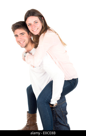 Young man carrying girlfriend on his back Stock Photo