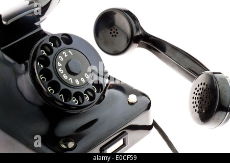 An antique, old fixed network telephone. Phone on white background., Ein antikes, altes Festnetz Telephon. Telefon auf weissem H Stock Photo
