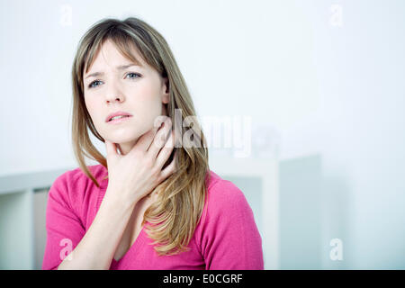 Woman with sore throat Stock Photo