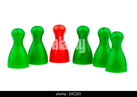 Red and green play figures. Differently in the team Stock Photo