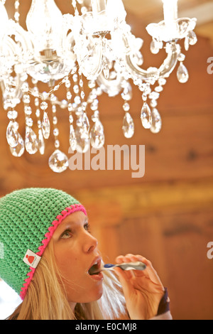 Young woman brushing her teeth, See, Tyrol, Austria Stock Photo