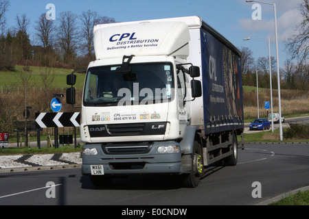 A CPL Distribution truck traveling around a roundabout in Coulsdon, Surrey, England Stock Photo