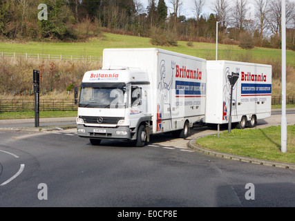 A Britannia truck entering a roundabout in Coulsdon, Surrey, England. Stock Photo