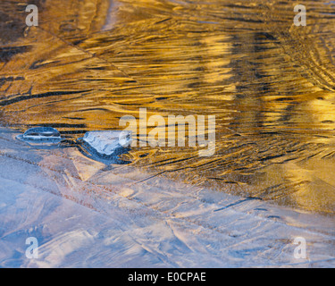 Ice structures and patterns on a frozen lake, Spiegelsee, Schladminger Tauern, Styria, Austria Stock Photo