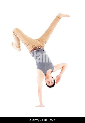 Young man dancing a breakdance and handstand pose Stock Photo