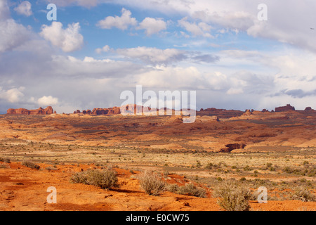 View from Park Avenue Viewpoint over the Petrified Dunes towards Balanced Rock and Windows Section, Arches National Park, Utah, Stock Photo