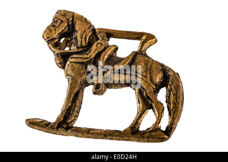 an ancient horse metal sculpture isolated on a white background Stock Photo