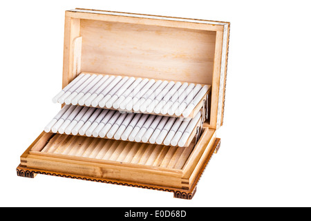 Cigarettes in old wooden box isolated over a white background Stock Photo