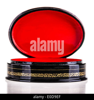 a black laquered box with a bright red interior isolated over white Stock Photo