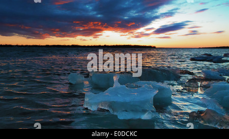The last ice of winter in the Niagara River at sunset. Stock Photo