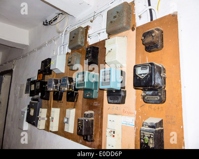 Many old stream counters for eletrischen stream in a dwelling house., Viele alte Stromzaehler fuer eletrischen Strom in einem Wo Stock Photo