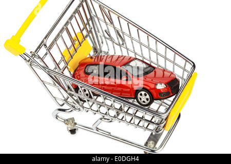 A car in the shopping cart as a symbol for autopurchase and leasing, Ein Auto im Einkaufswagen als Symbol fuer Autokauf und Leas Stock Photo