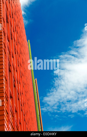 A bright orange and green facade on an office building at Central Saint Giles in London, England UK Stock Photo