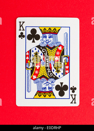 Old playing card (king) isolated on a red background Stock Photo