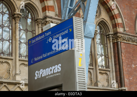 A yellow letter 'i' symbol on an Information Point at London Eurostar Hub, St Pancras Station London Britain UK terminal. Stock Photo