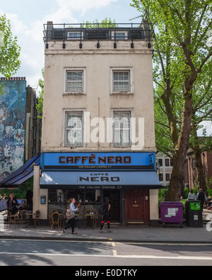 The facade of a Caffè Nero store on Tottenham Court Road, London, England, Britain, British, UK. Stock Photo