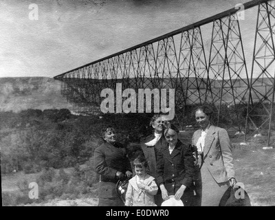 Unidentified Group Posing Near The Canadian Pacific Railway High Level Bridge Stock Photo