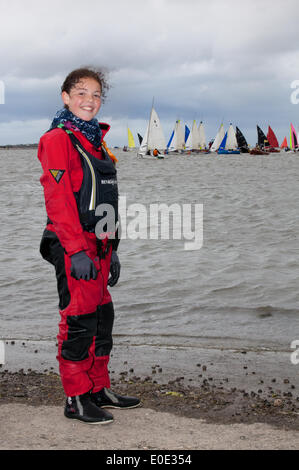 West Kirby, Liverpool. 10th May, 2014.  Enla Marston,12 a competitor at the British Open Team Racing Championships Trophy 2014.  Sailing’s Premier League ‘The Wilson Trophy’ 200 Olympic-class sailors compete annually on Kirby’s marine amphitheatre in one of the World’s favourite events hundreds of spectators follow 300 short, sharp frenzied races in three-boat teams jostling on the marina lake to earn the coveted title: “Wilson Trophy Champion.” Credit:  Mar Photographics/Alamy Live News Stock Photo