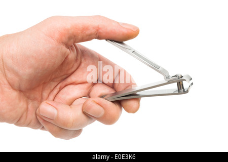 steel nail clippers in hand on white background Stock Photo