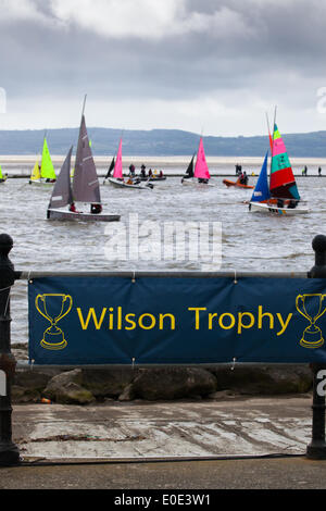 West Kirby, Liverpool. 10th May, 2014. Banner at the British Open Team Racing Championships Trophy 2014.  Sailing’s Premier League ‘The Wilson Trophy’ 200 Olympic-class sailors compete annually on Kirby’s marine amphitheatre in one of the World’s favourite events where hundreds of spectators follow 300 short, sharp frenzied races in three-boat teams jostling on the marina lake to earn the coveted title: “Wilson Trophy Champion.” Credit:  Mar Photographics/Alamy Live News Stock Photo