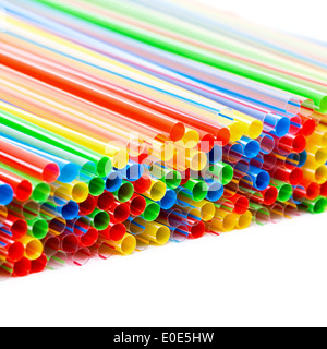Colored Plastic Drinking Straws on a white background Stock Photo
