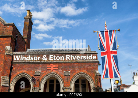 Windsor and Eton railway station brick building and Union Jack flag - Windsor, Berkshire, UK Stock Photo