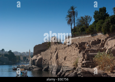 Tourist boats near southern corner of Elephantine Island, near Nilometer, Aswan, Upper Egypt Stock Photo